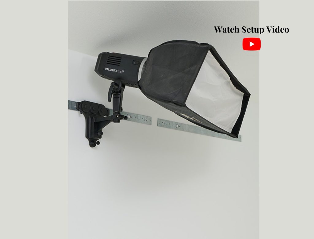 Hair or edge light mounted to a metal wall
